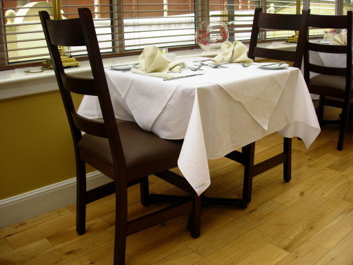 Aaron Lodge, Edinburgh.Solid oak Ferme H dining chair, metal based tables with solid oak tops.