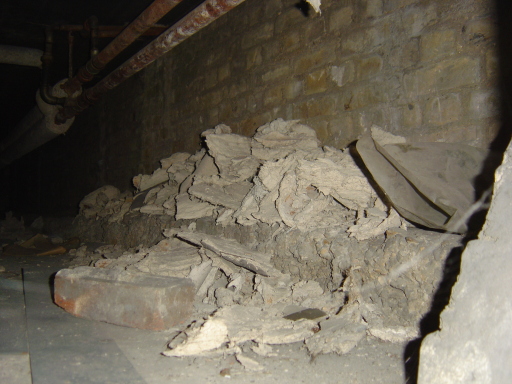 asbestos pipe insulation uncontrolled removal by plumbers who are now at risk