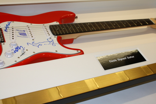 Framed Oasis Guitar