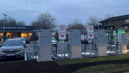 Multiple InstaVolt ultra-rapid chargers outside Starbucks in Peterborough, offering convenient access for EV drivers visiting Ortongate Retail Park.