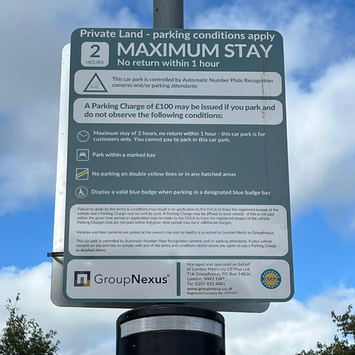 Clear signage displaying parking conditions and time limits for EV users at the InstaVolt charging site on Plymouth Road, with enforcement details and accessibility guidance.
