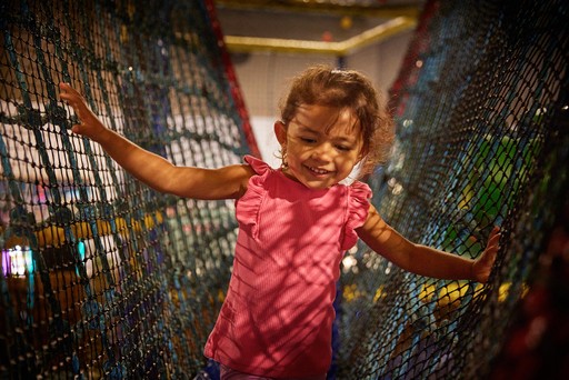Child playing in Rusty's Funhouse at Hunters Quay Holiday Village