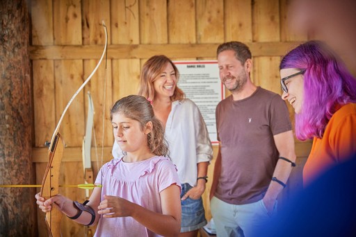Family take part in Archery at Hunters Quay Holiday Village