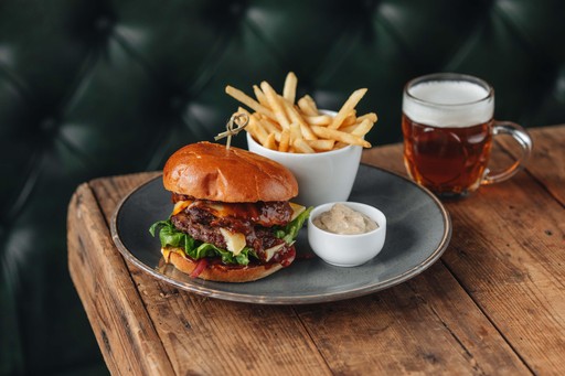 Double burger, pulled beef, bacon, smoked cheddar, pickles, skinny fries