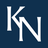 Ken Newcombe funeral directors logo.