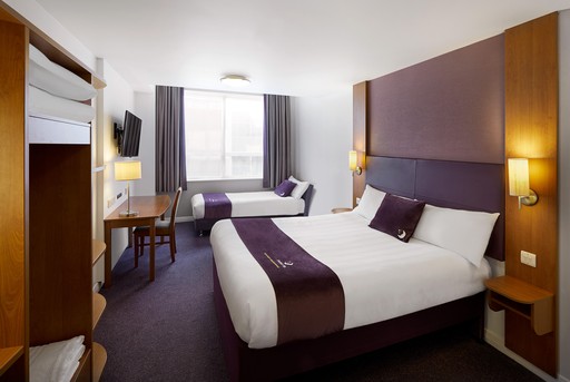 Premier Inn twin room with double bed, single sofa bed and flat screen TV