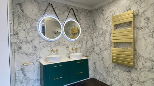 Wall hung bathroom display featuring double basin and mirror