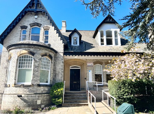 Outside of Bupa Dental Care Kelvin Lodge in spring