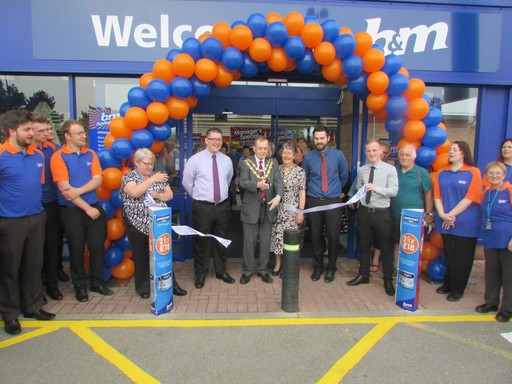 B&M Bridgwater being formally opened by representatives from the Brainwaves charity who also gratefully received £250 worth of B&M vouchers.