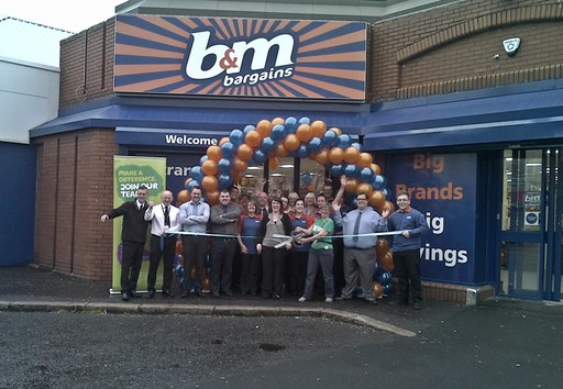 Cynthia Cherry from the Northern Ireland branch of Macmillan Cancer Support cut the ribbon at the opening ceremony of B&M's brand new Cregagh Road, Belfast store.