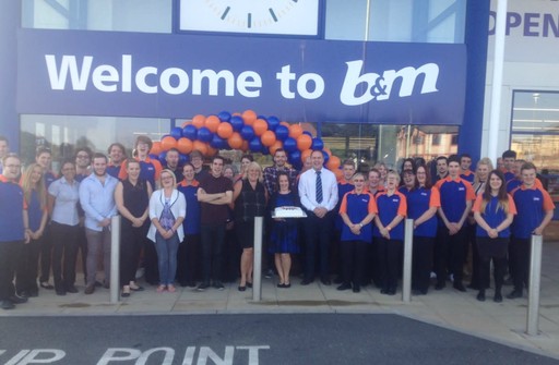 B&M Stowmarket store team pose in front of their brand new Bargains store on Milton Road South.