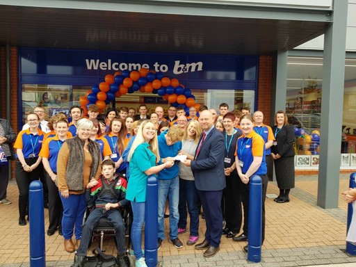 Local charity Dynamic were B&M Wrexham's special guests for their opening day event. They received £250 worth of B&M vouchers as a thank you for taking part.