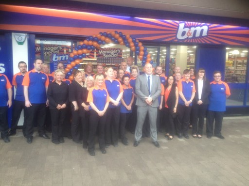The B&M Kirkby team pose in front of their new and refurbished store at St Chads Parade (former Co-op)