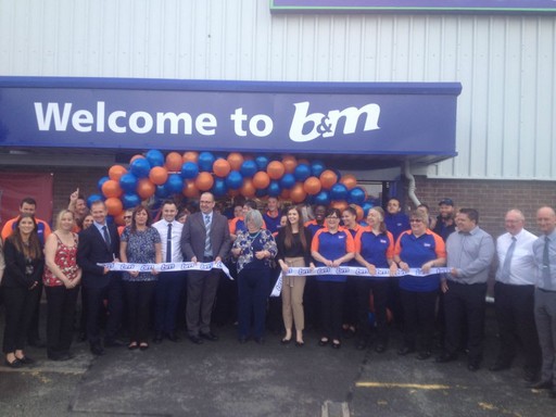 B&M Pembroke Dock being officially opened by the Mayor of Pembroke, Councillor Maureen Colgan, and Liz, a representative of Pennar Community Hall.