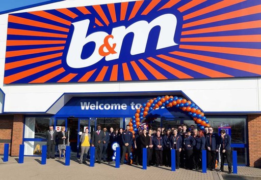 Store staff at B&M's Willenhall store celebrate the re-opening of their store at Keyway Retail Park, after refurbishment works.
