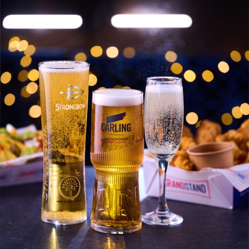 Enjoy ice-cold drinks and great food while catching every sporting moment at Grandstand.