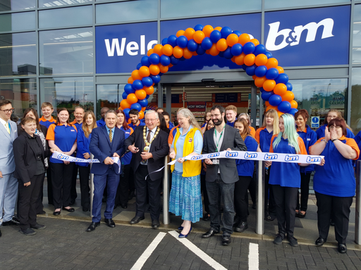 Provost Tom Kerr was on hand to cut the ribbon at the opening ceremony of B&M's new store Livingston.