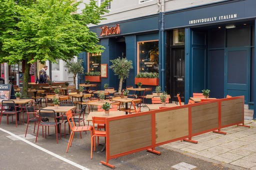 Exterior view of Zizzi St Andrews entrance and outside dining area.