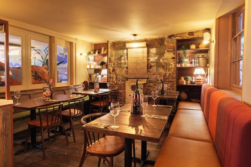 Warm Zizzi Winchester interior with cosy booths.