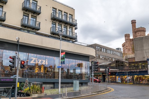 Zizzi Inverness, open-plan dining with full-height windows overlooking the River Ness.