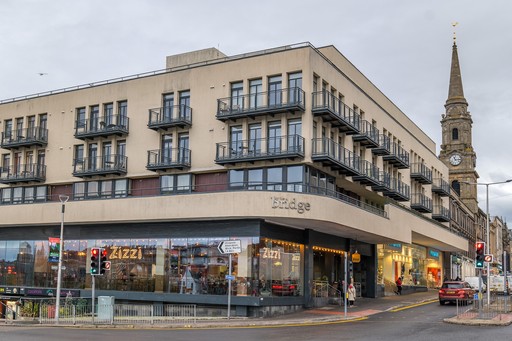 Zizzi Inverness, open-plan dining with full-height windows overlooking the River Ness.