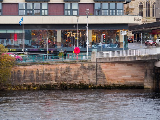 Zizzi Inverness, open-plan dining with full-height windows overlooking the River Ness.