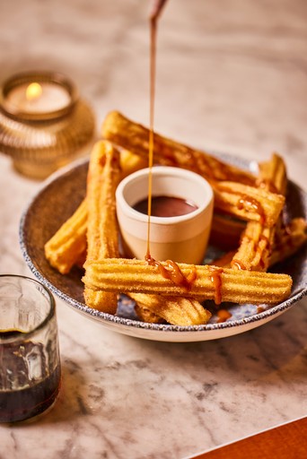 Churros with dulce de leche
