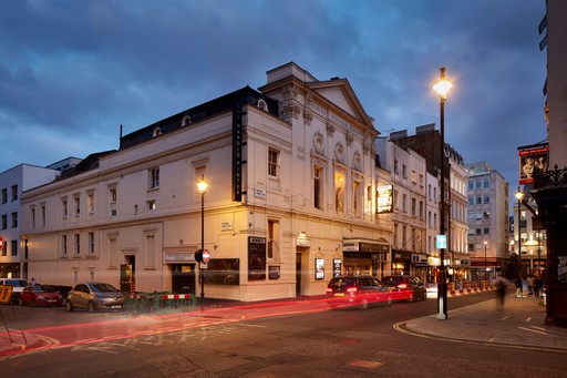 Side on view of Harold Pinter Theatre at dusk