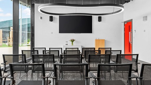 Swansea Arena Meeting Room 9/10 in theatre layout, empty