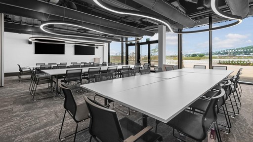 Swansea Arena Meeting Room 2/3/4 in boardroom layout, empty