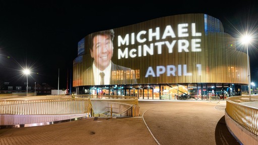 Swansea Arena digital façade with Michael McIntyre show ad