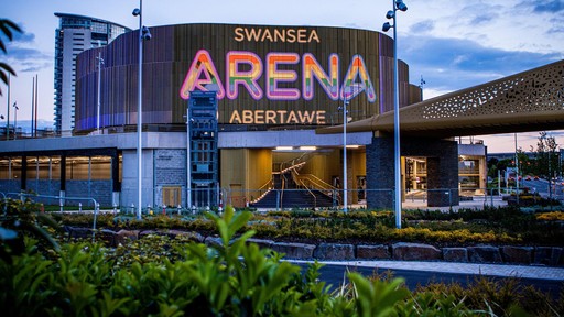 Swansea Arena digital façade from road level, during Pride month 2022