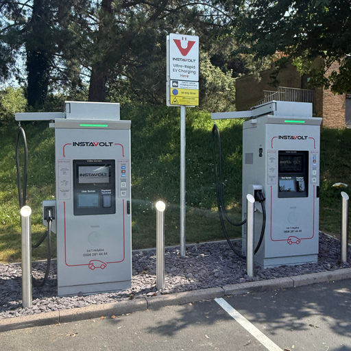 InstaVolt ultra rapid EV charging hub on Reigate Road, Dorking, featuring modern charging bays and convenient access from the A25, making it an ideal stop for EV drivers.