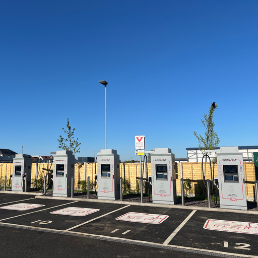 Wide view of InstaVolt ultra rapid EV chargers in Larkhall with clearly marked bays and open access layout