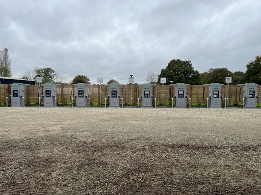 Six InstaVolt chargers positioned in a row at Frankies Farm Shop, providing ultra-fast EV charging access in a spacious parking area.