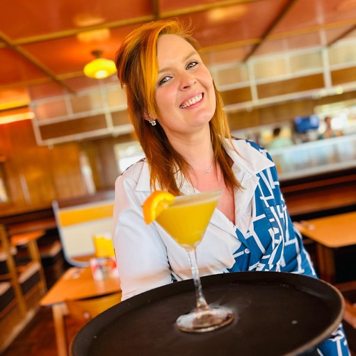 Brightside Team serving cocktail