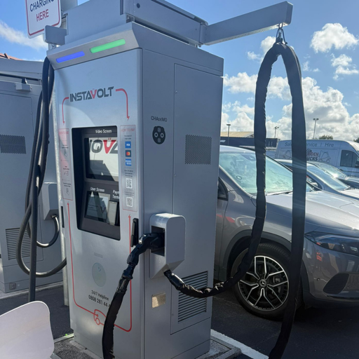 A close-up view of an InstaVolt charger in action, highlighting cable management, clear instructions, and accessibility at the McDonald's Middlesbrough EV charging location.