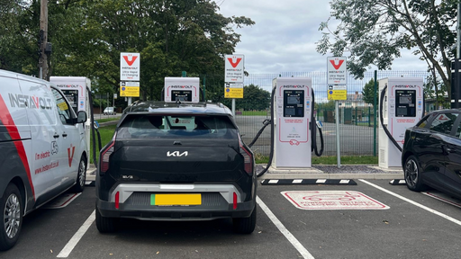This photo shows multiple vehicles using InstaVolt’s ultra-rapid EV chargers at a clean and well-marked charging bay. The site includes visible signage, safety markings, and a branded support van, reflecting a professional and user-friendly environment for electric vehicle drivers.