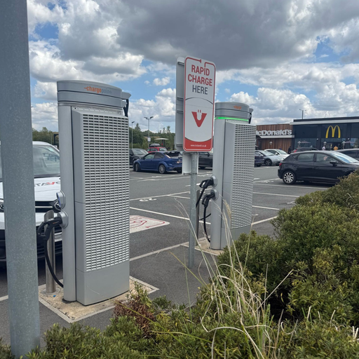 InstaVolt EV chargers in a retail car park near McDonald’s, with rapid charge signage.