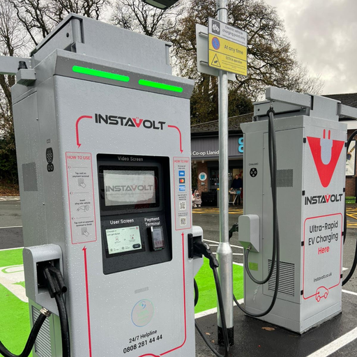 Detailed view of InstaVolt ultra-rapid chargers at Co-op Llanidloes, showing user interface, clear signage and accessible setup.