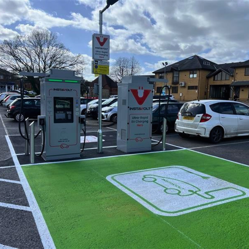 Close view of InstaVolt ultra rapid chargers at Co-op Hedge End, showing clearly marked EV charging bay and easy access parking.