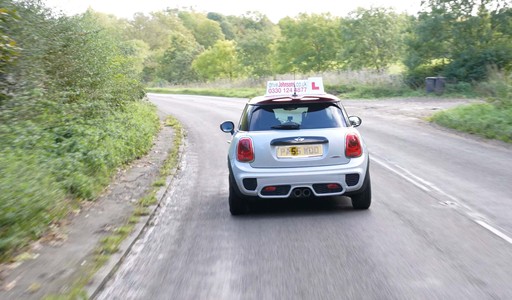 A driveJohnson's driving instructor on a lesson