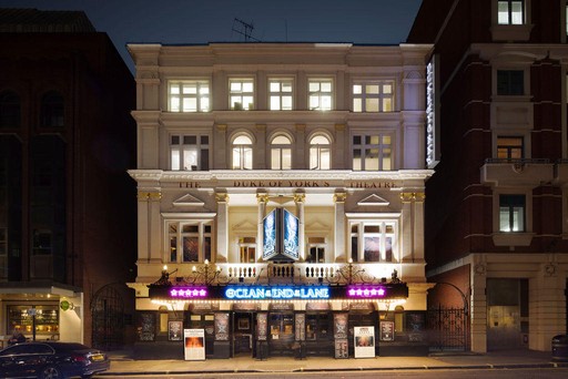 Front on of the Duke of York's theatre at night