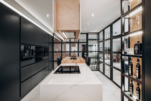 Dark kitchen design, Crittall partition, UK