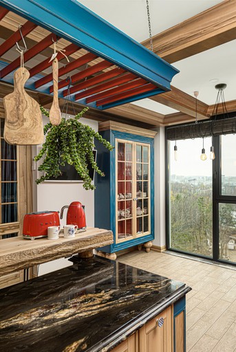 Custom kitchen, granite worktop, timber ceiling, U