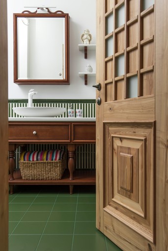 Bathroom design, bespoke wood door, green tile, UK