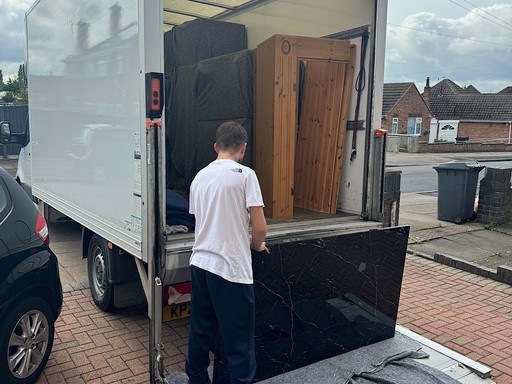 Leicester removals loading a marble table 
