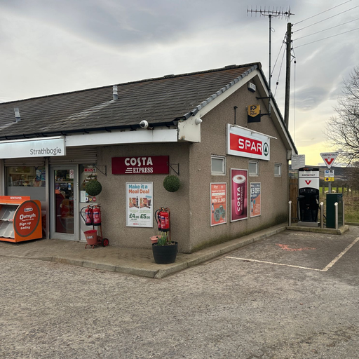 Rapid InstaVolt charger located beside the SPAR shop at Strathbogie Filling Station on the A96 near Huntly, with Costa Express and promotional signage in view.