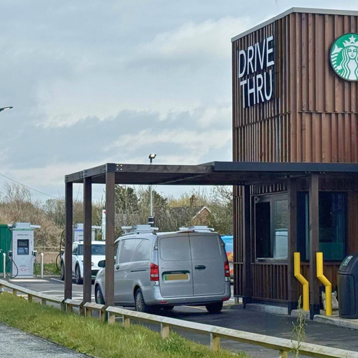 Convenient drive thru Starbucks located next to InstaVolt charging bays.