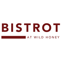 Official logo for Bistrot at Wild Honey, featuring modern typography in deep red and tan tones.
